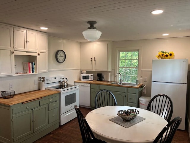 kitchen featuring white appliances, dark wood-type flooring, wood counters, white cabinetry, and green cabinets