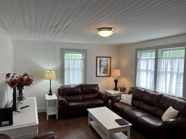 living room with a healthy amount of sunlight, wood ceiling, and dark wood finished floors