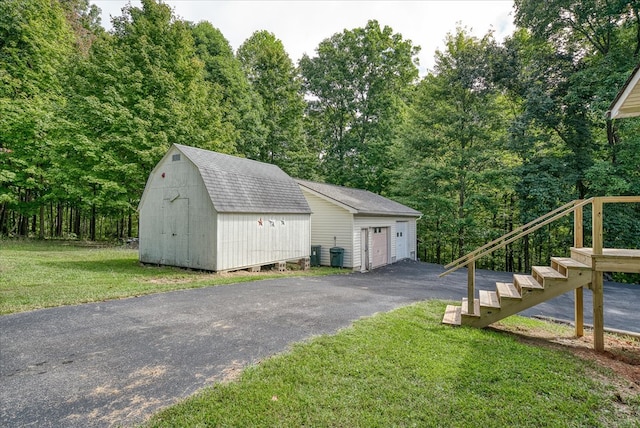 view of shed featuring stairway