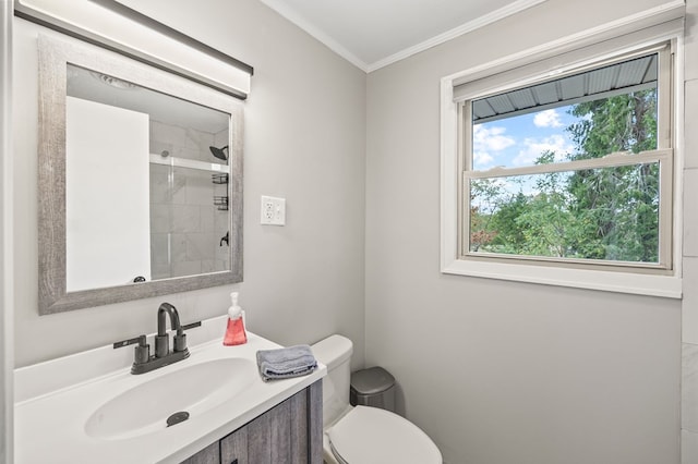 full bath featuring ornamental molding, toilet, a shower stall, and vanity