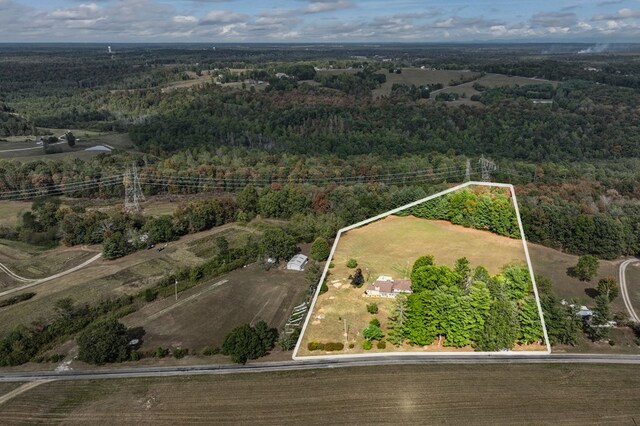 drone / aerial view with a forest view