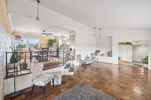 living room with lofted ceiling and ceiling fan