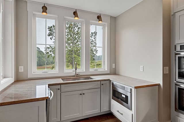 1036 Hidden River Rd, Rock Island, TN 38581 - kitchen with healthy amount of natural light and appliances with stainless steel finishes