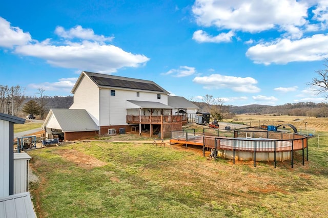 view of yard featuring a deck