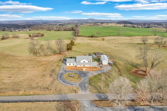 birds eye view of property featuring a rural view and a mountain view