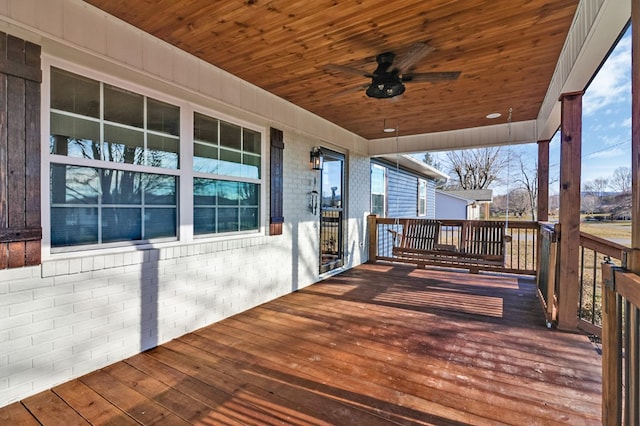 wooden terrace with ceiling fan