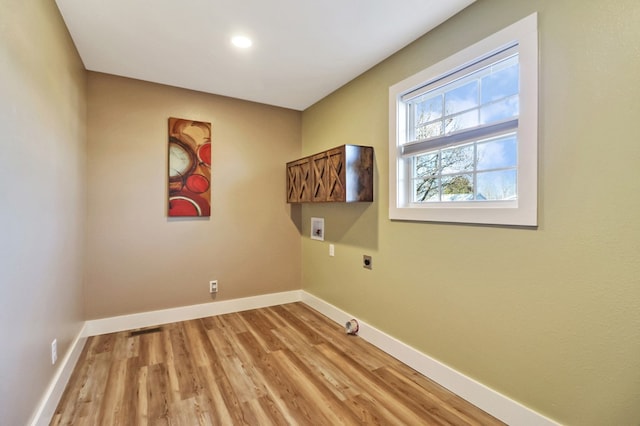 washroom featuring hookup for a washing machine, laundry area, hookup for an electric dryer, and baseboards