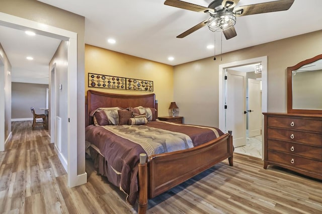 bedroom featuring baseboards, ceiling fan, light wood finished floors, and recessed lighting