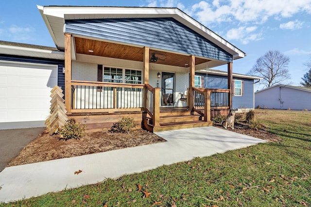 view of front of house featuring a front lawn, a porch, and brick siding