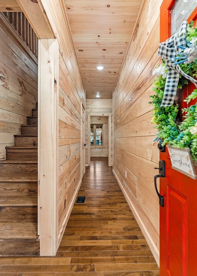 106 Raccoon Ln, Jamestown, TN 38556 - hallway with wooden walls, wooden ceiling, recessed lighting, dark wood-type flooring, and stairs