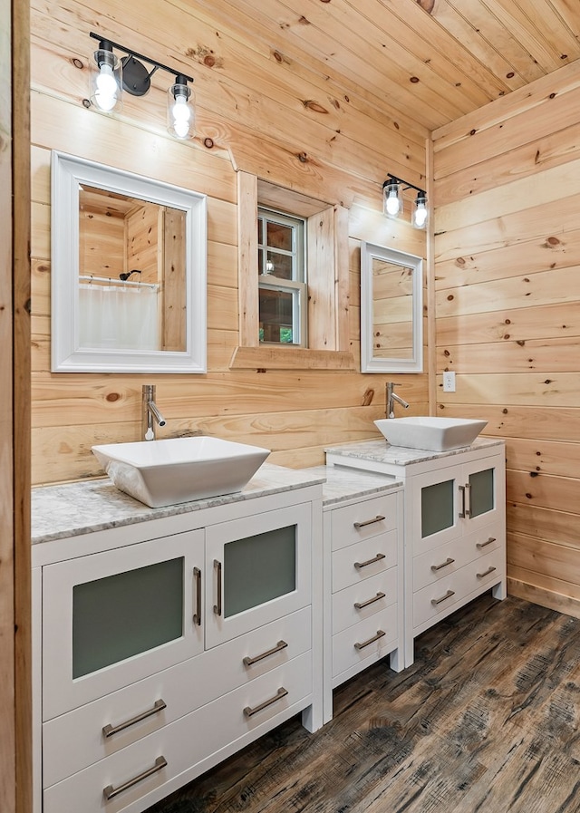 106 Raccoon Ln, Jamestown, TN 38556 - full bath with double vanity, wood walls, wood finished floors, and wooden ceiling