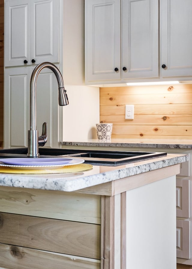 106 Raccoon Ln, Jamestown, TN 38556 - kitchen view of white cabinetry and light stone countertops