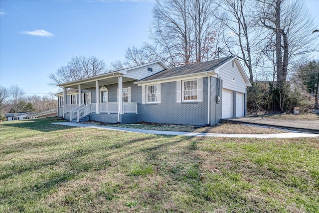 ranch-style home with driveway, brick siding, an attached garage, a porch, and a front yard