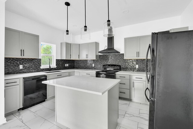 kitchen featuring marble finish floor, black appliances, light countertops, and a center island