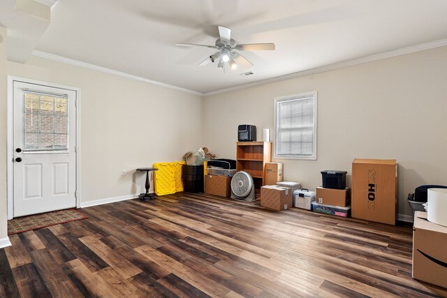 office area with ceiling fan, baseboards, dark wood finished floors, and crown molding