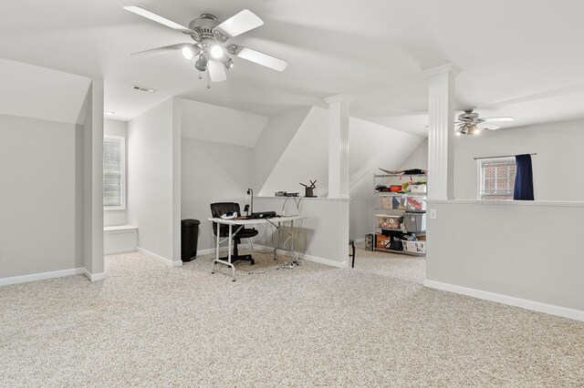 office featuring visible vents, baseboards, light colored carpet, ceiling fan, and vaulted ceiling