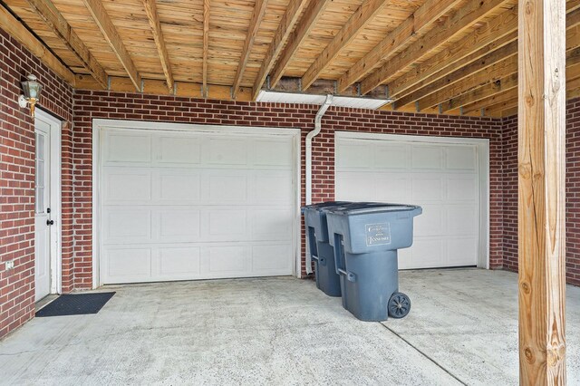 garage featuring driveway