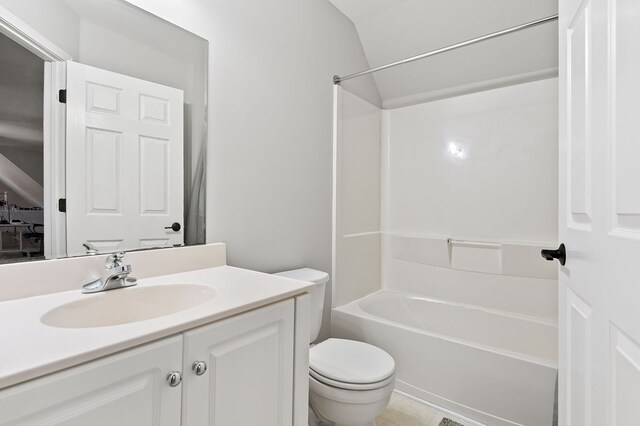 full bath with  shower combination, vanity, and toilet