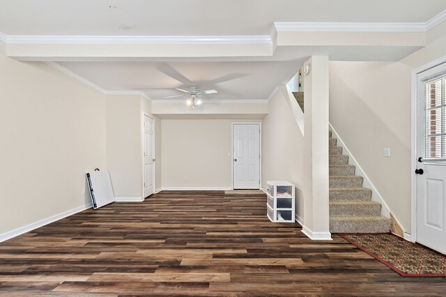 entrance foyer with baseboards, stairs, ornamental molding, and dark wood finished floors