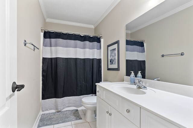 full bathroom featuring crown molding, curtained shower, toilet, vanity, and tile patterned floors