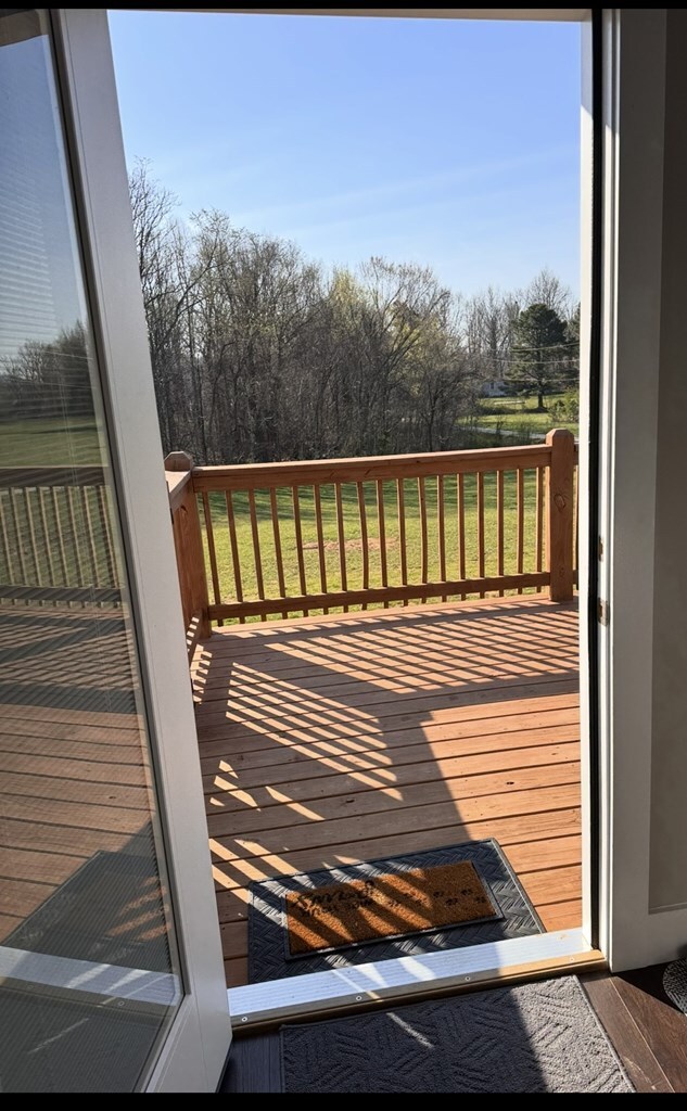 8501 Faix Rd, Byrdstown, TN 38549 - wooden terrace featuring view of wooded area