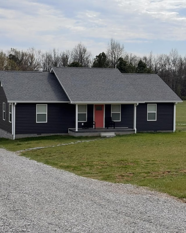 8501 Faix Rd, Byrdstown, TN 38549 - ranch-style house with covered porch, roof with shingles, a front yard, and gravel driveway