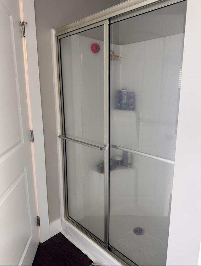 8501 Faix Rd, Byrdstown, TN 38549 - bathroom with a shower stall and baseboards