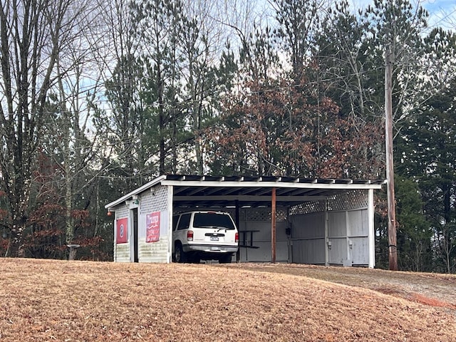 garage with a detached carport