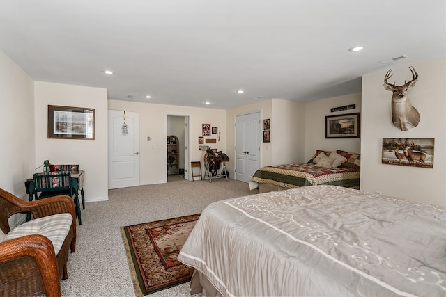 bedroom featuring light carpet, baseboards, visible vents, and recessed lighting