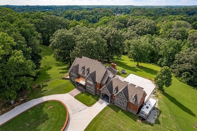 bird's eye view with a view of trees