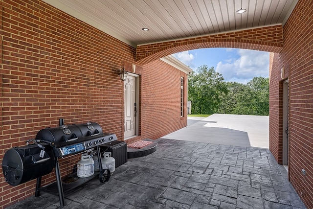 view of patio with a grill