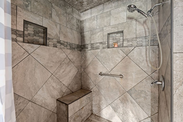 details with a tile shower