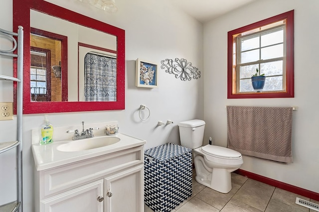 bathroom with visible vents, baseboards, toilet, tile patterned flooring, and vanity