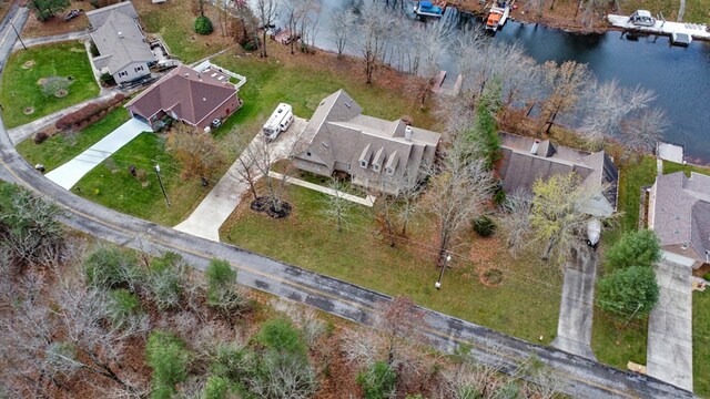 bird's eye view with a water view and a residential view