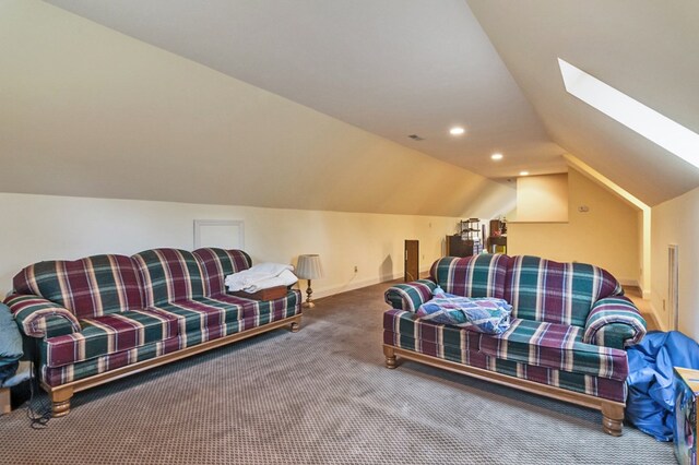 carpeted bedroom with vaulted ceiling with skylight, baseboards, and recessed lighting