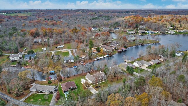 drone / aerial view featuring a water view and a residential view