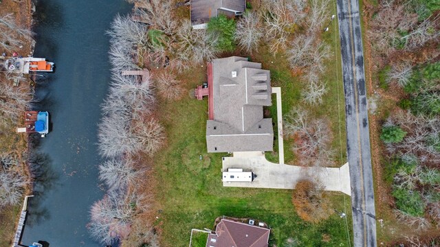 bird's eye view with a water view