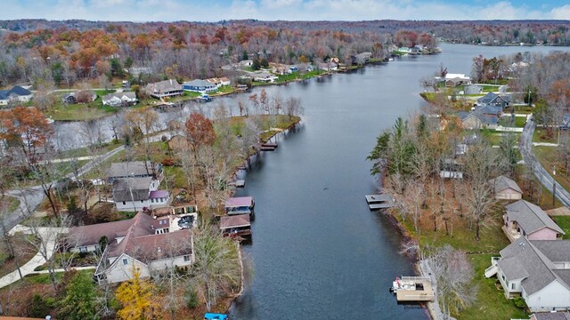 bird's eye view with a residential view and a water view