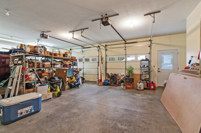 garage featuring a garage door opener