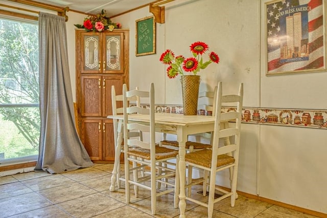 5088 Baptist Ridge Rd, Hilham, TN 38568 - dining area with ornamental molding and light tile patterned floors