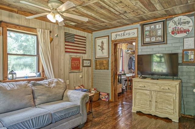 5088 Baptist Ridge Rd, Hilham, TN 38568 - living area with wood ceiling, ceiling fan, wood walls, and dark wood-style flooring