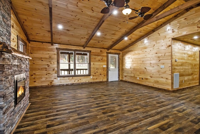 unfurnished living room with dark wood-type flooring, wood ceiling, a fireplace, and vaulted ceiling with beams