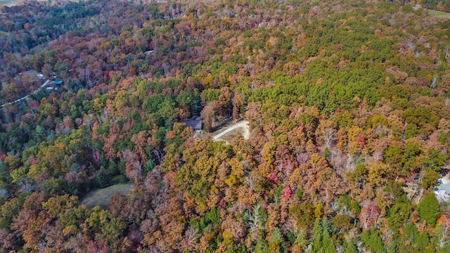 aerial view featuring a view of trees