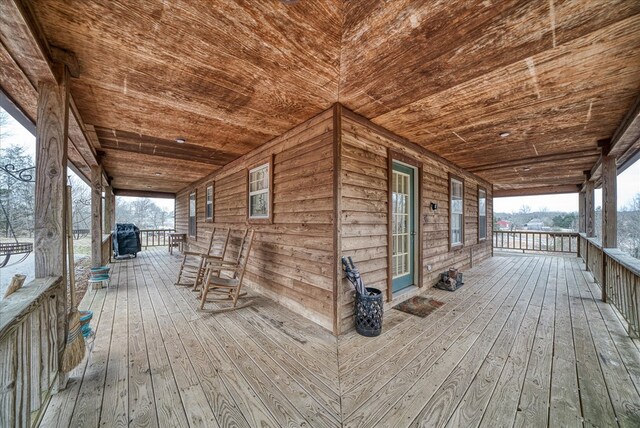 wooden deck featuring grilling area