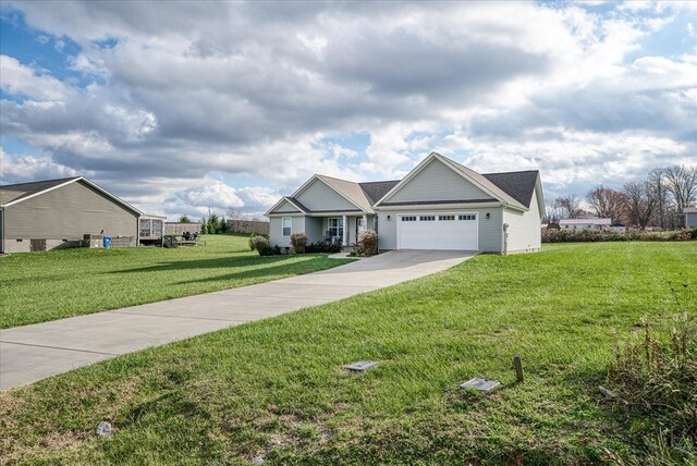 single story home featuring an attached garage, concrete driveway, and a front yard