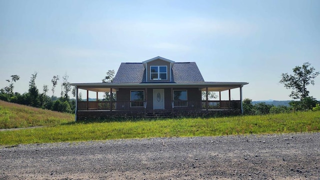 357 Taylor Rd, Byrdstown, TN 38549 - farmhouse-style home with a porch