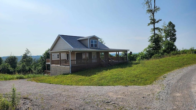 357 Taylor Rd, Byrdstown, TN 38549 - country-style home with a porch