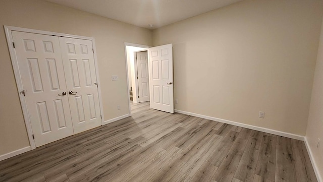 357 Taylor Rd, Byrdstown, TN 38549 - unfurnished bedroom with wood finished floors and a closet