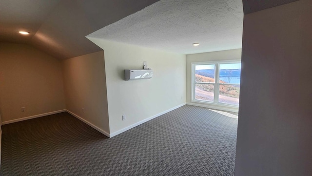 357 Taylor Rd, Byrdstown, TN 38549 - additional living space with dark carpet, lofted ceiling, and recessed lighting