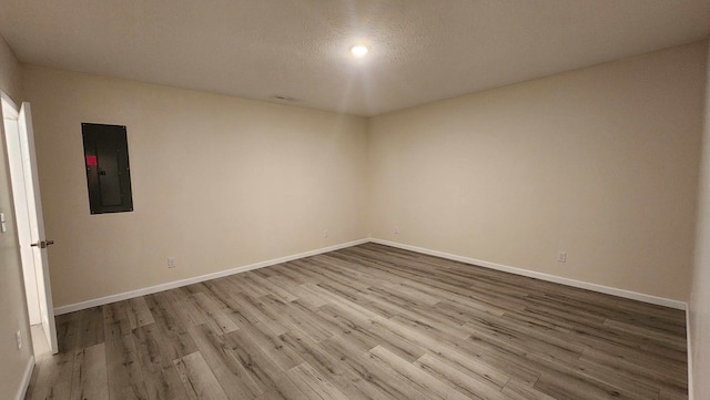 357 Taylor Rd, Byrdstown, TN 38549 - empty room featuring electric panel and wood finished floors